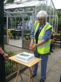 Isobel cuts the Birthday cake